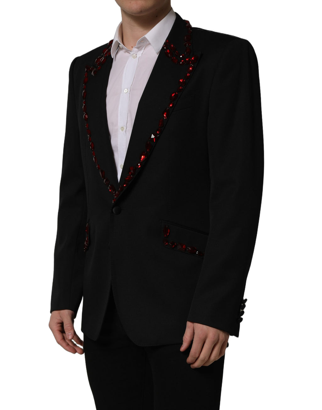 Veste blazer Dolce & Gabbana noire ornée de cristaux, élégante et sophistiquée, visible en détail sur l'image.