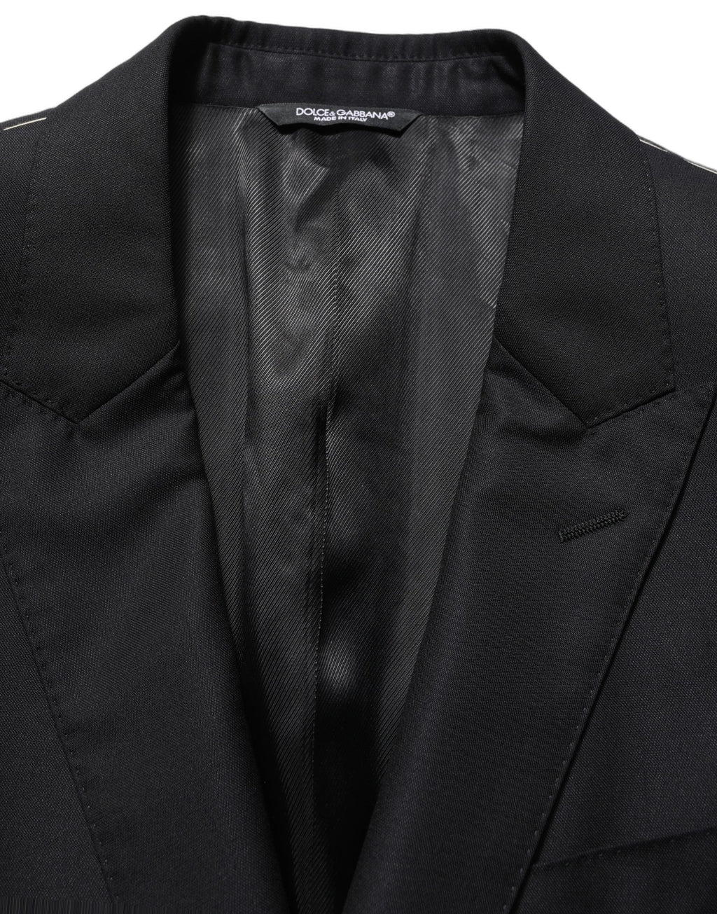Blazer pour homme en laine noire Dolce & Gabbana, à simple boutonnage, style élégant et sophistiqué.