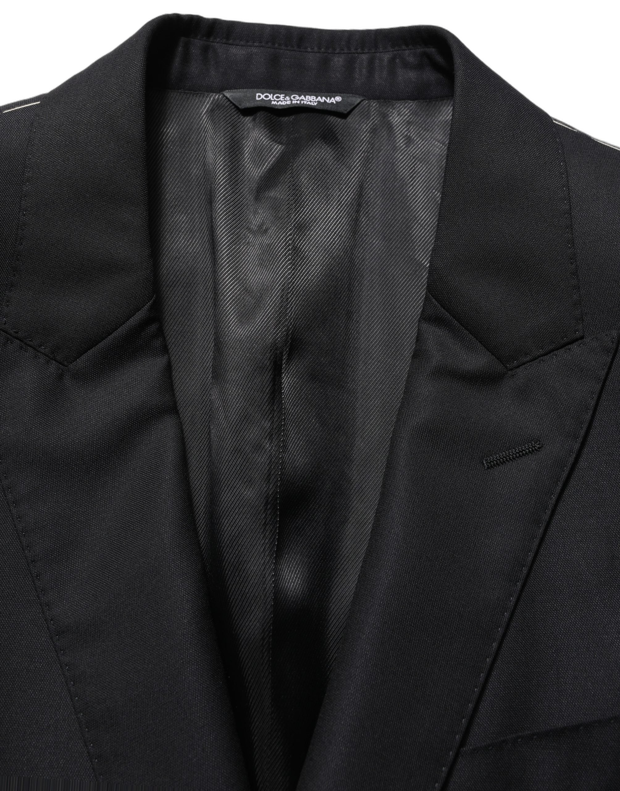Blazer pour homme en laine noire Dolce & Gabbana, à simple boutonnage, style élégant et sophistiqué.