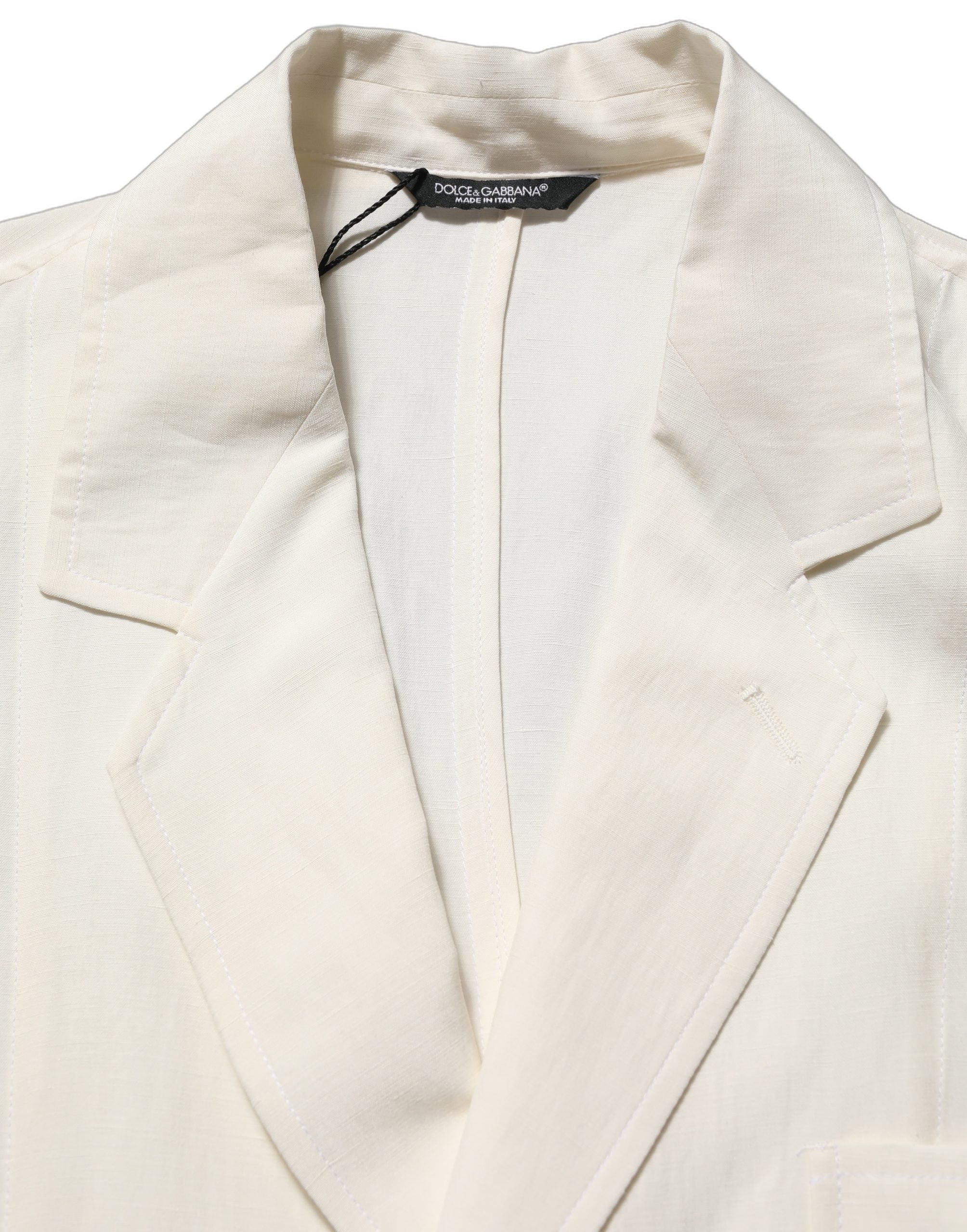Veste blazer Dolce & Gabbana en lin blanc cassé, coupe simple à un bouton, style élégant et sophistiqué.