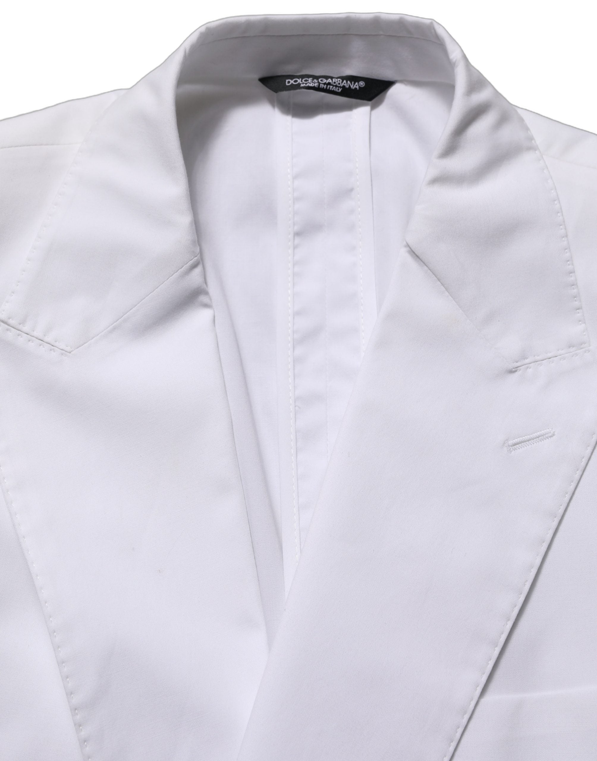 Veste blazer blanche en coton Dolce & Gabbana à double boutonnage, élégante et structurée, vue de face sur fond neutre.