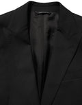 Dolce & Gabbana Schwarzer Blazer aus Polyester mit Einzelknopfverschluss