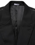 Veste blazer en laine noire Dolce & Gabbana à boutonnière simple, élégante et ajustée, vue de face.