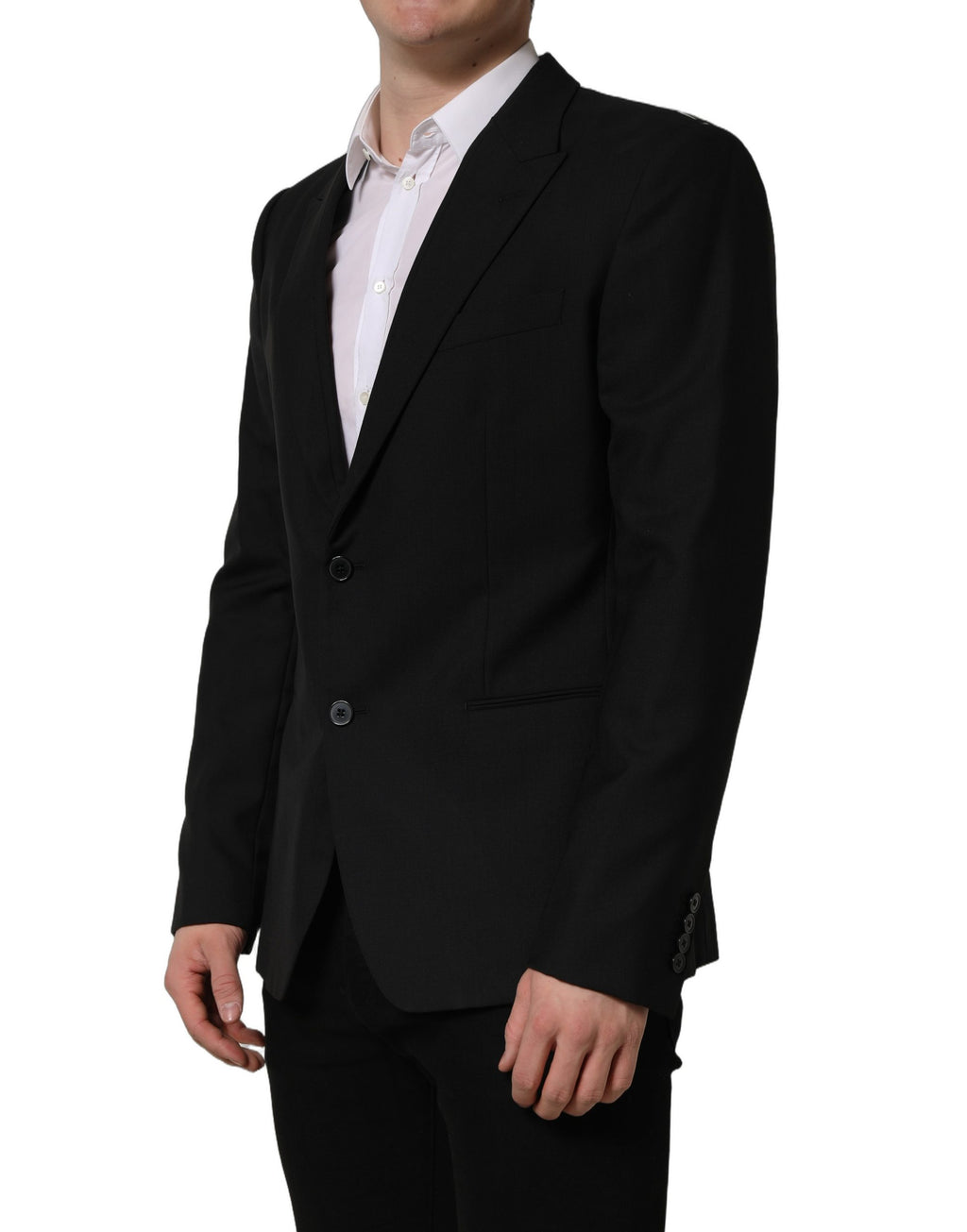 Blazer noir en laine Dolce & Gabbana à simple boutonnage, veste élégante avec col cranté et poches latérales.