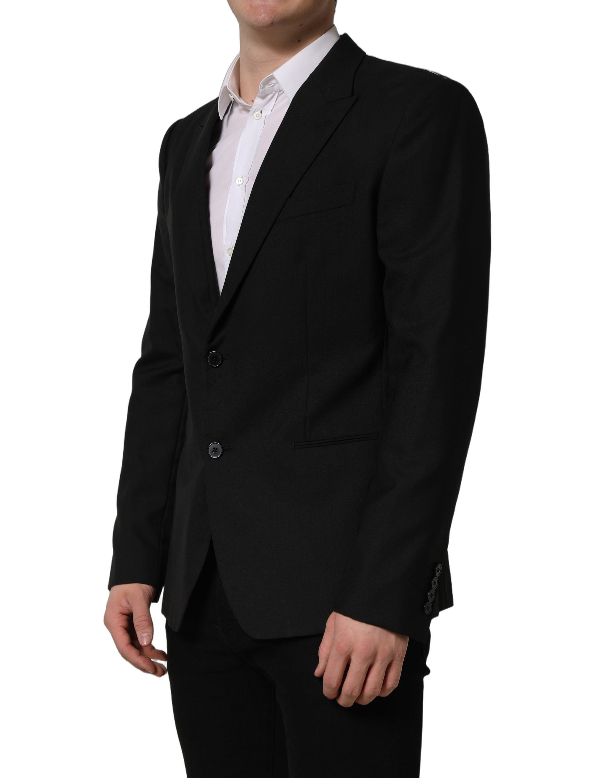 Blazer noir en laine Dolce & Gabbana à simple boutonnage, veste élégante avec col cranté et poches latérales.
