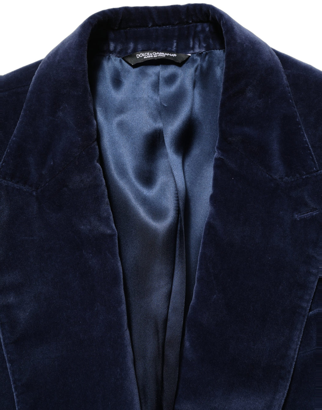 Veste blazer en velours bleu Dolce & Gabbana à boutonnage simple, élégante et sophistiquée, vue de face.