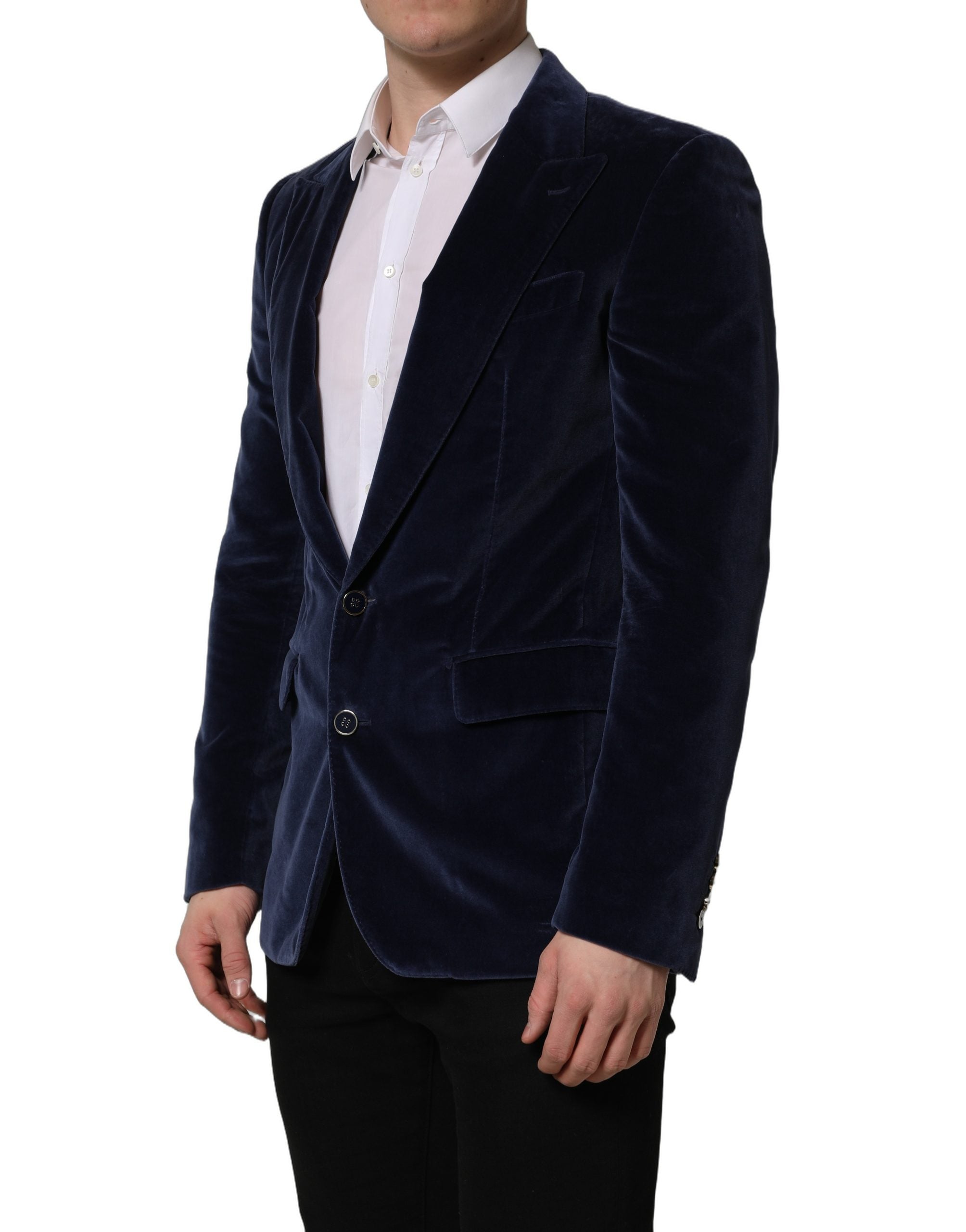 Blazer en velours bleu Dolce & Gabbana à simple boutonnage, ajusté et élégant, porté sur un modèle.