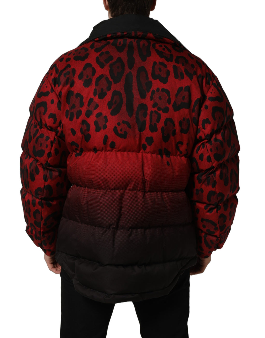 Doudoune réversible Dolce & Gabbana à imprimé animal rouge et noir, coupe chaude et style élégant.