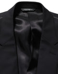 Blazer Dolce & Gabbana en laine noire à double boutonnage, veste élégante pour homme, vue de face sur fond blanc