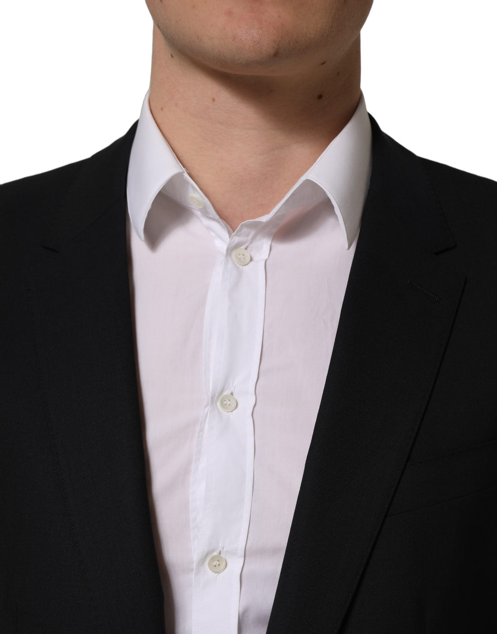 Veste blazer en laine noire Dolce & Gabbana à simple boutonnage, élégante et sophistiquée, vue de face sur un fond neutre.