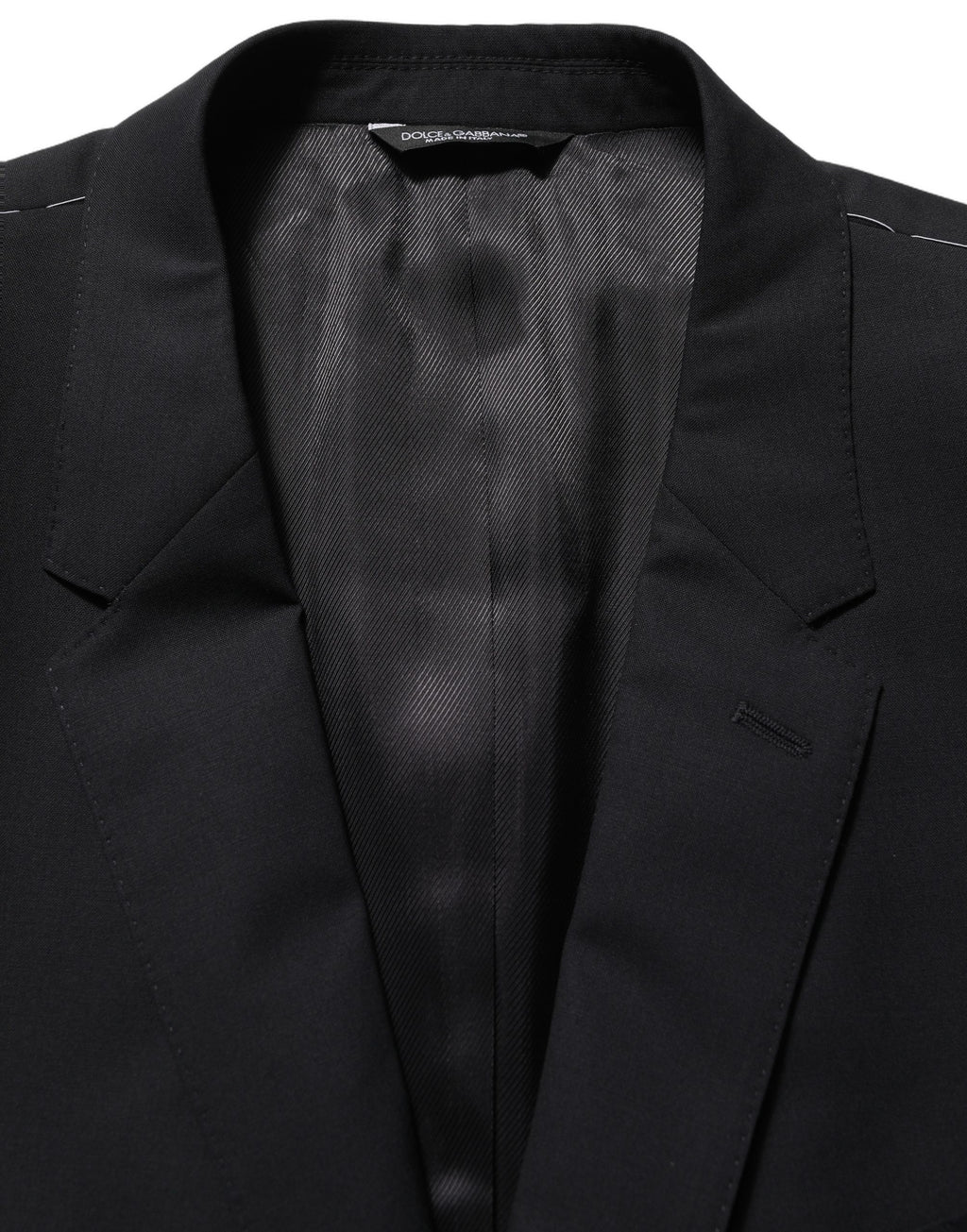 Veste blazer en laine noire Dolce & Gabbana à boutonnage simple, élégante et sophistiquée, vue de face.