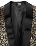 Manteau homme Dolce & Gabbana en or à motif léopard, à simple boutonnage, style élégant et tendance.