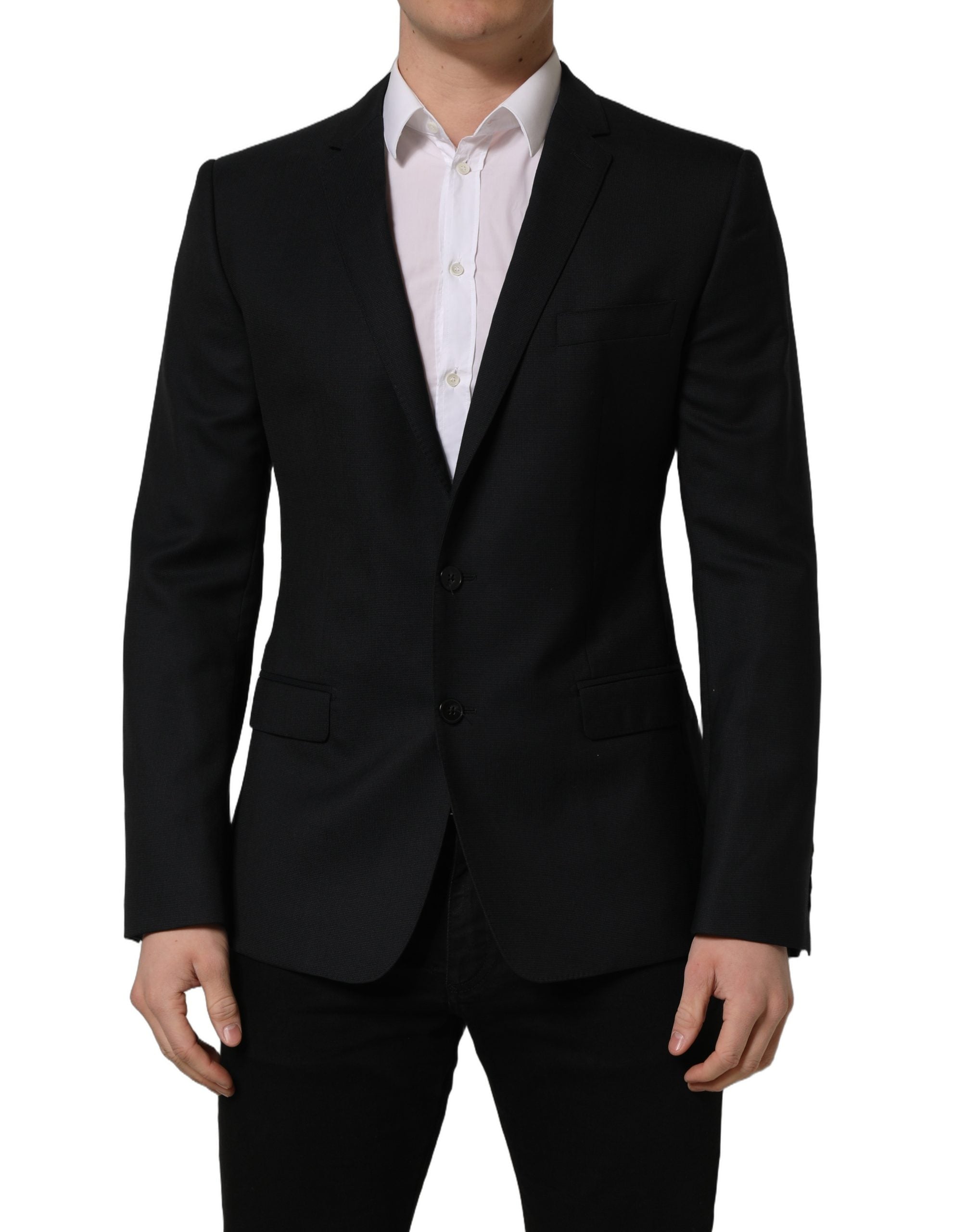 Blazer noir en laine Dolce & Gabbana à boutonnière simple, coupe élégante et détails sophistiqués, porté sur un mannequin.