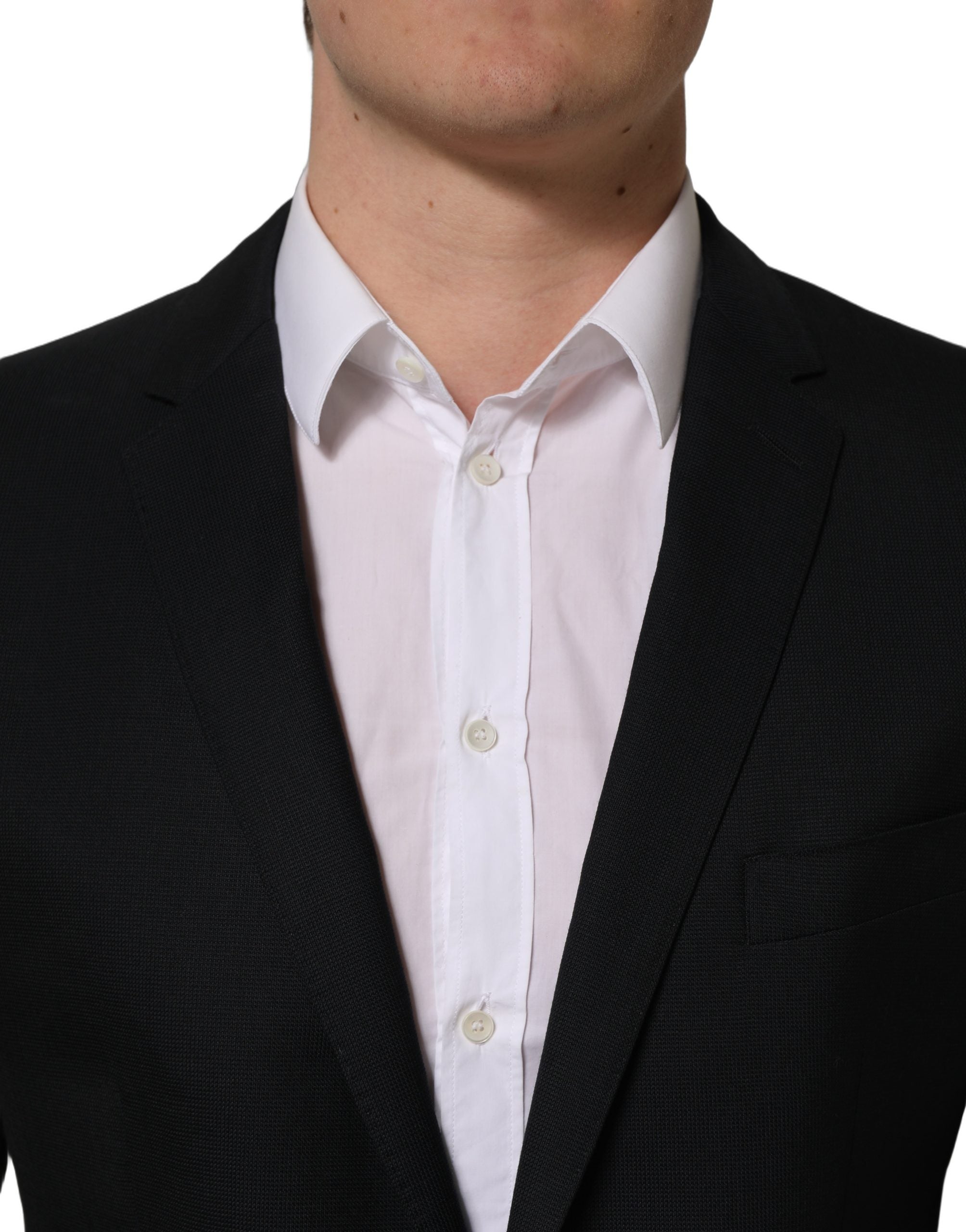 Blazer noir en laine Dolce & Gabbana à boutonnière simple, veste élégante pour homme ou femme, détail classique en tissu.