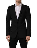 Blazer noir en laine Dolce & Gabbana, veste à simple boutonnage, élégante et classique, portée sur un mannequin.