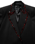 Veste blazer Dolce & Gabbana noire ornée de cristaux brillants, élégante et sophistiquée, pour un look chic et luxe.