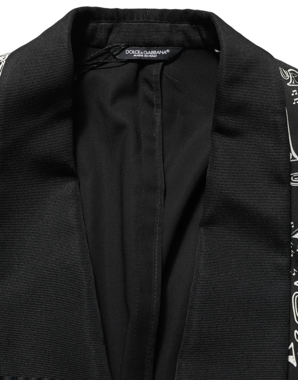 Blazer noir Dolce & Gabbana avec embellissements en cristal, veste élégante en tissu sophistiqué, détails raffinés et couture haut de gamme.