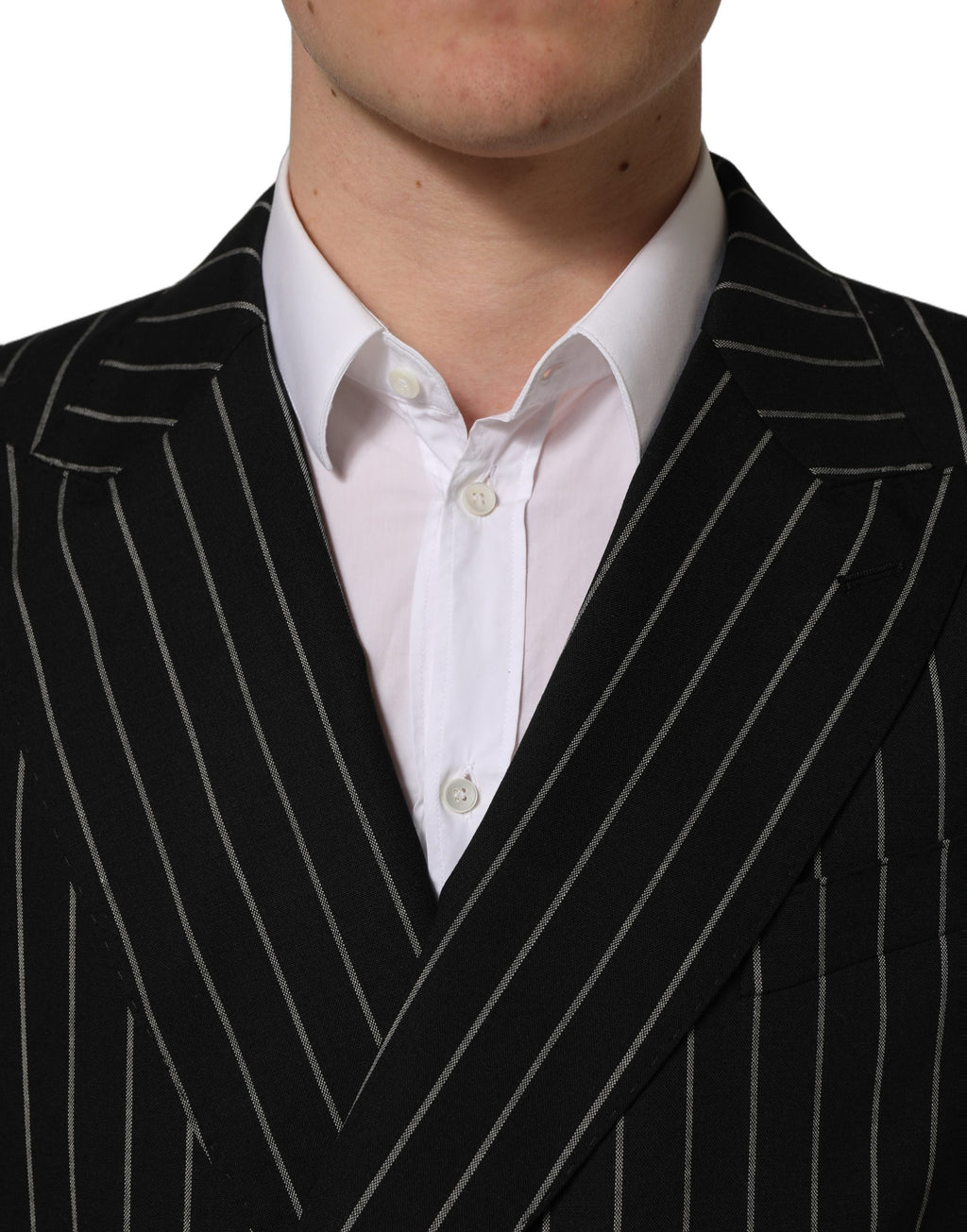 Veste en laine à rayures noires Dolce & Gabbana, double boutonnage, style élégant et sophistiqué.