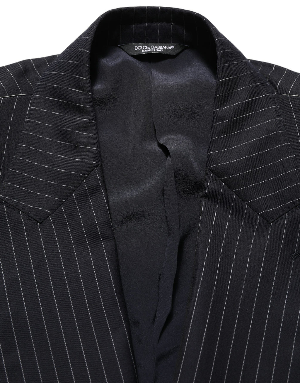 Veste en laine noire à rayures Dolce & Gabbana, double boutonnage, style élégant et sophistiqué.