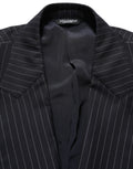 Veste en laine noire à rayures Dolce & Gabbana, double boutonnage, style élégant et sophistiqué.