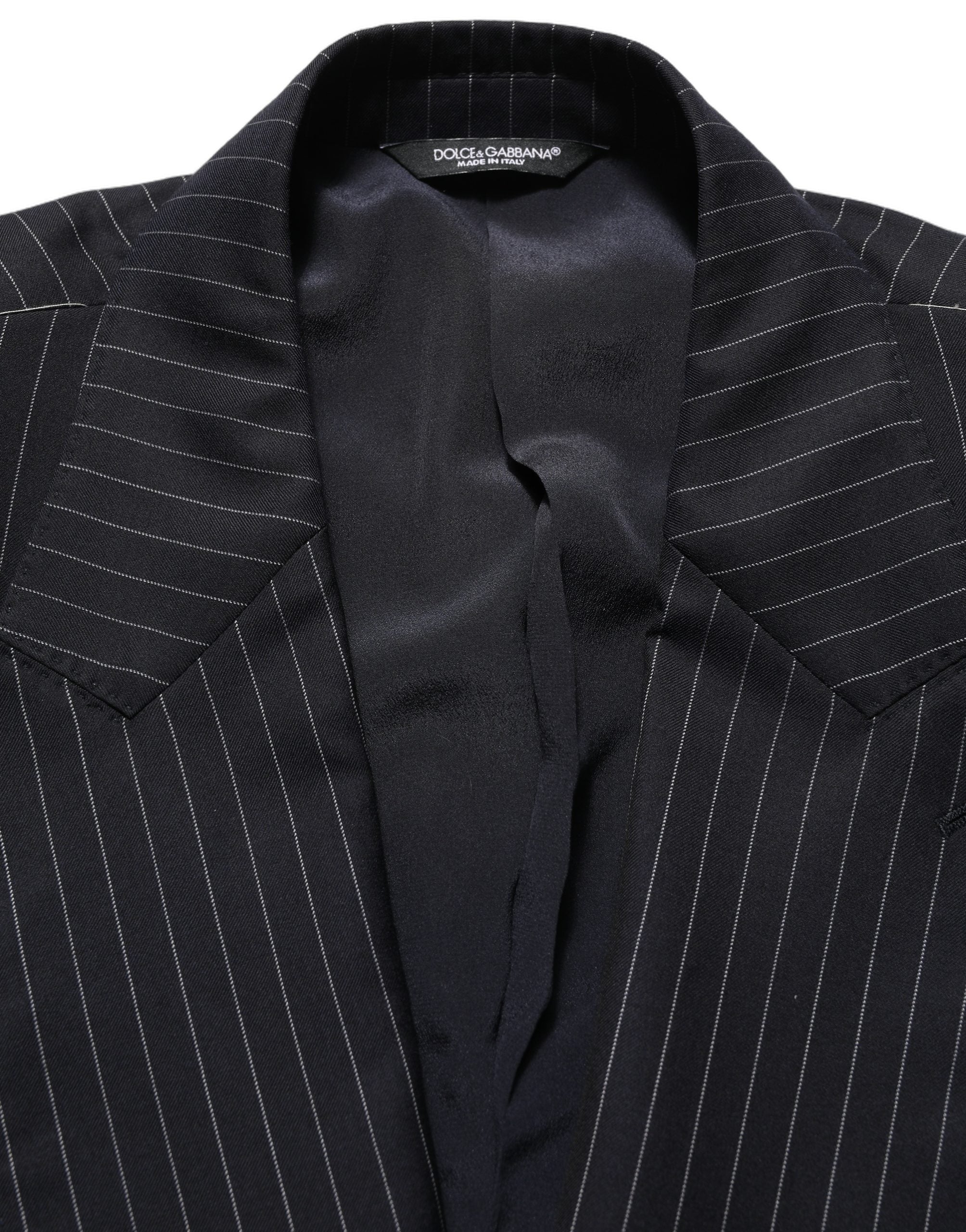 Veste en laine noire à rayures Dolce & Gabbana, double boutonnage, style élégant et sophistiqué.