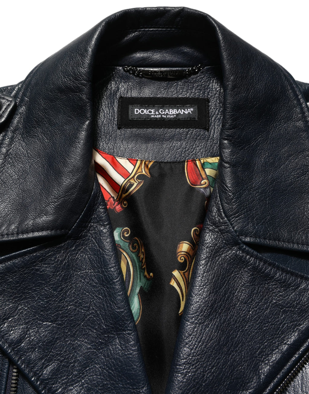 Manteau en cuir noir pour homme de style biker de Dolce & Gabbana, en peau de chèvre, avec détails robustes et élégants.