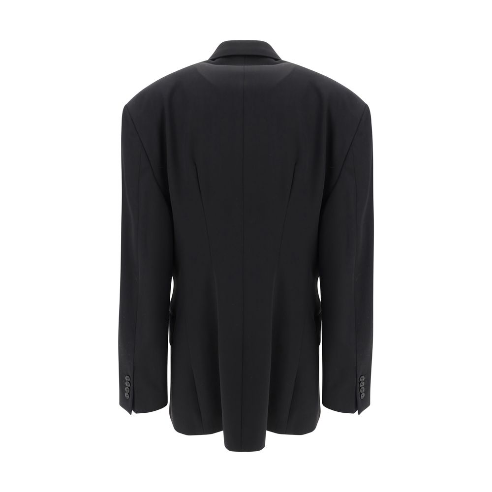Blazer en laine noire Balenciaga Oves Aries, coupe élégante, détails sophistiqués, porté sur un mannequin.