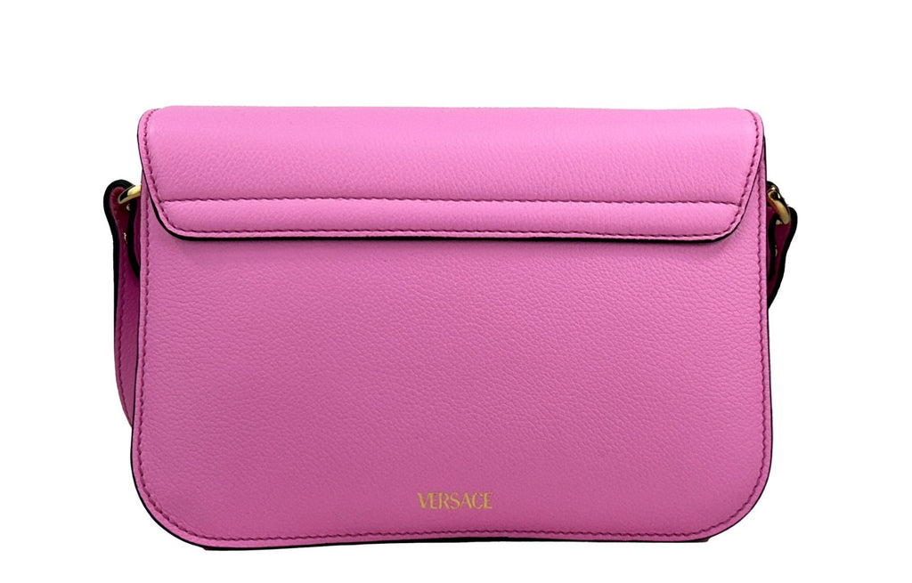 Sac à bandoulière en cuir rose Versace La Medusa, sac à main élégant avec logo Medusa en or et design sophistiqué.