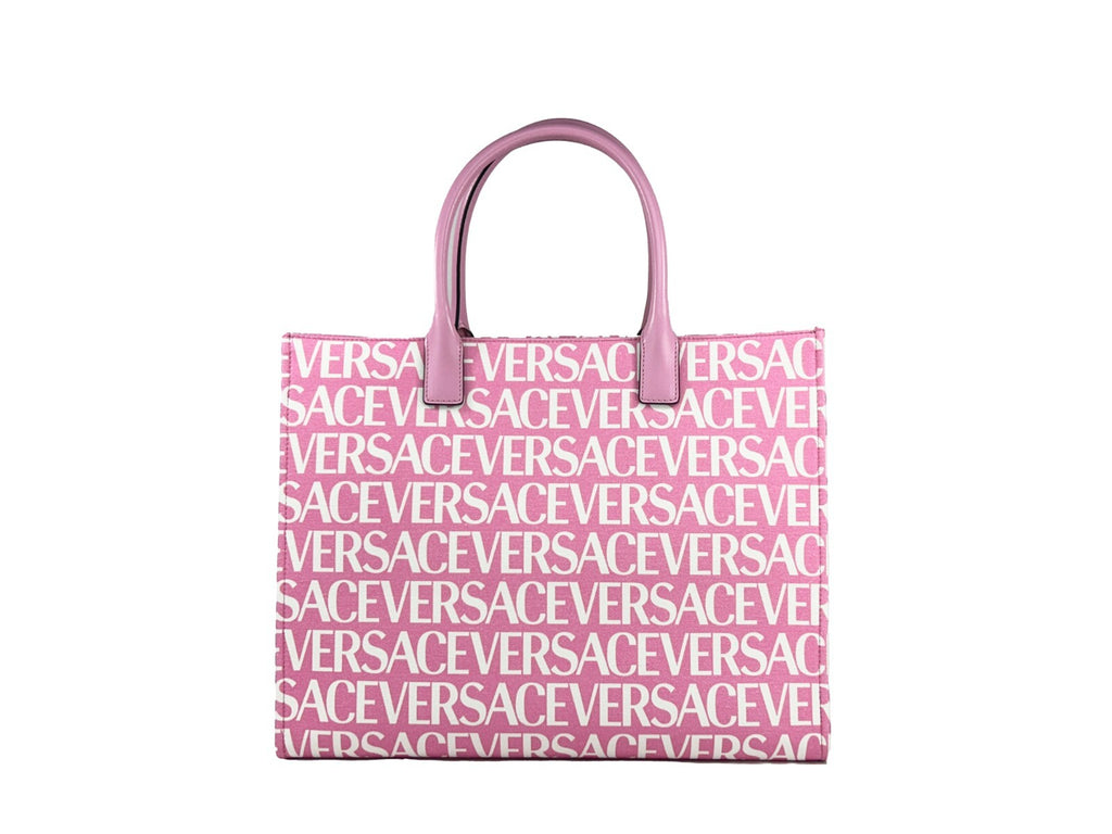 Grand sac cabas en toile de canvas rose bébé avec logo Medusa de Versace, design élégant et spacieux.