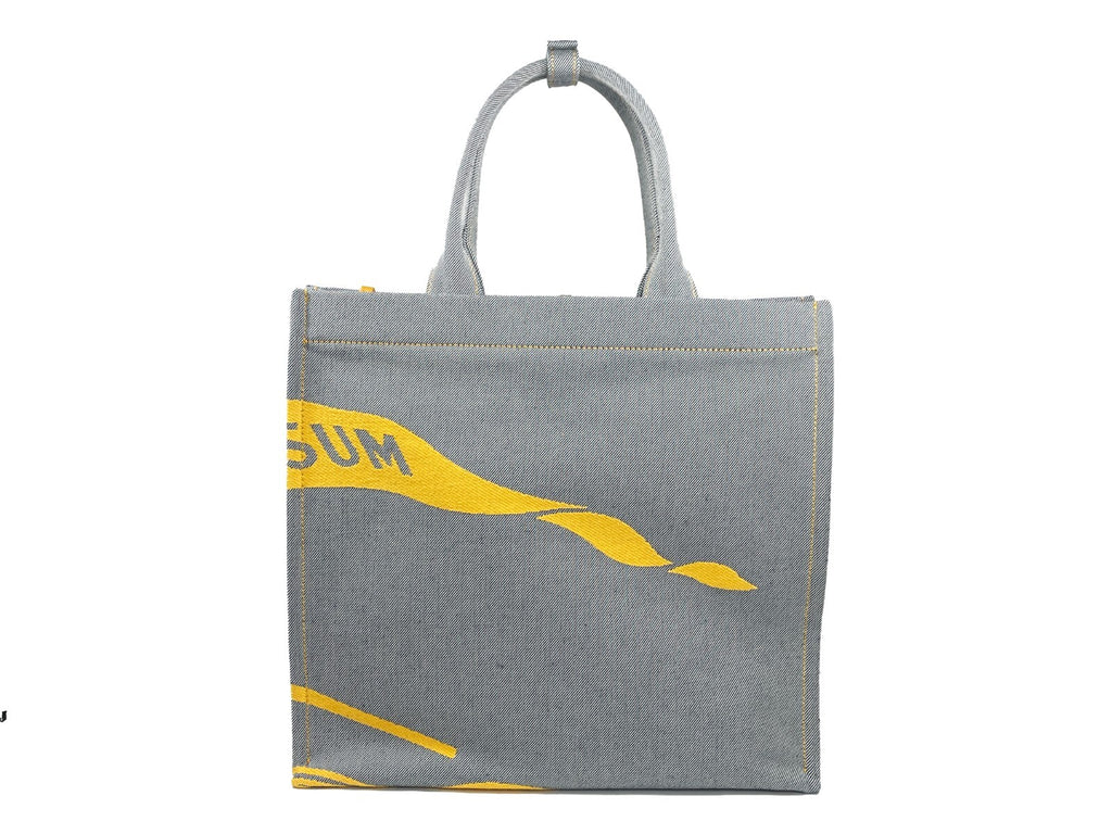 Sac à main en toile Burberry EKD avec pochette à monnaie, design élégant et logo distinctif, visible en détail sur l'image.
