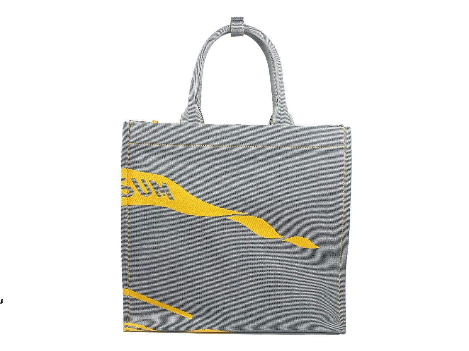 Sac à main en toile Burberry EKD avec pochette à monnaie, design élégant et logo distinctif, visible en détail sur l'image.