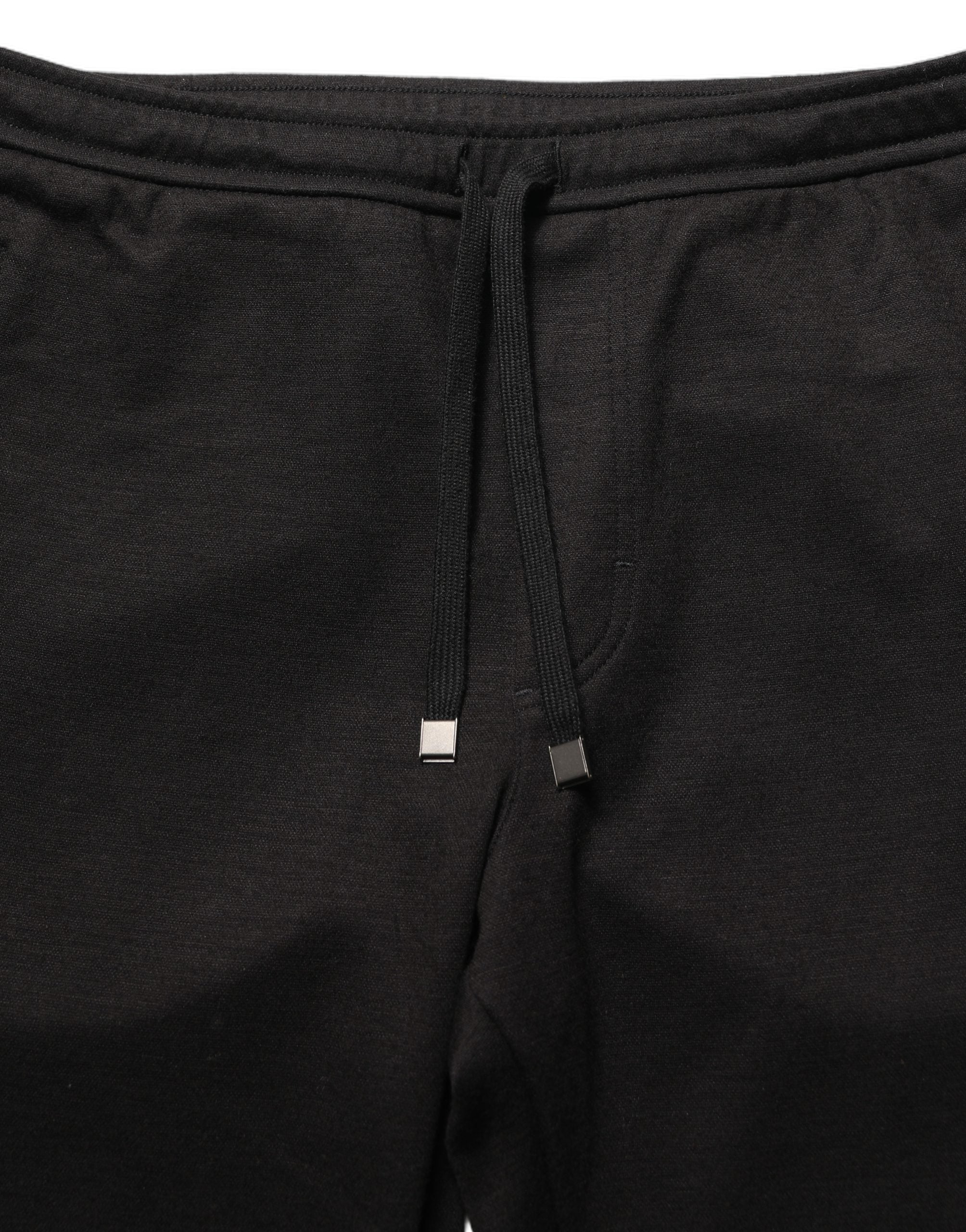 Pantalon jogging en laine noire Dolce & Gabbana pour homme, pantalon de sport élégant avec cordon de serrage et poches.