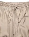 Pantalon jogging cargo parachute brun Dolce & Gabbana pour homme avec détails froncés et style décontracté.