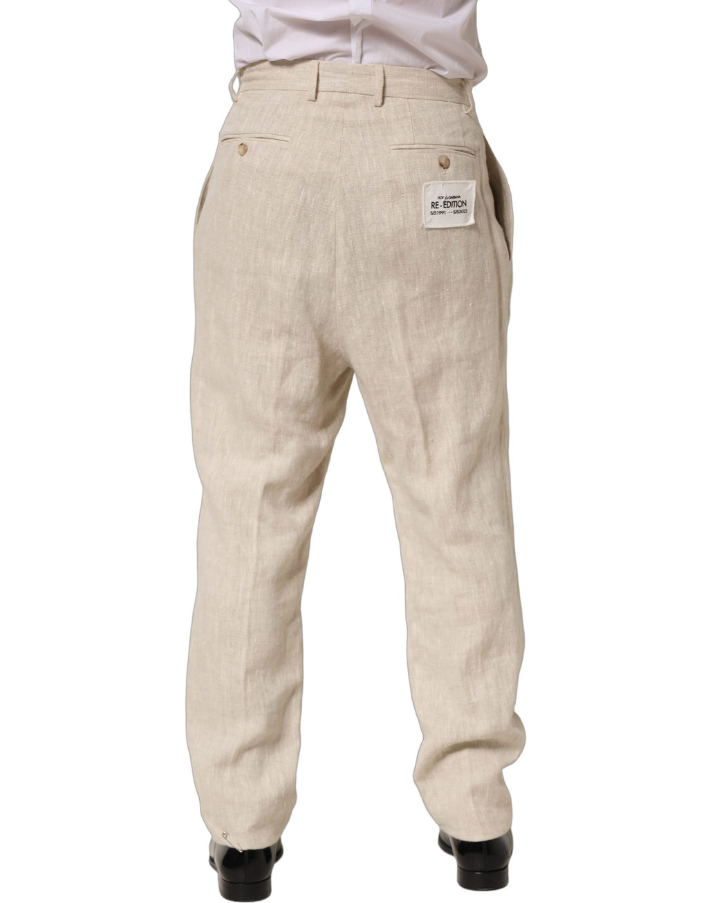 Pantalon homme beige en lin Dolce & Gabbana, pantalon coupe tapered élégant et confortable pour hommes.