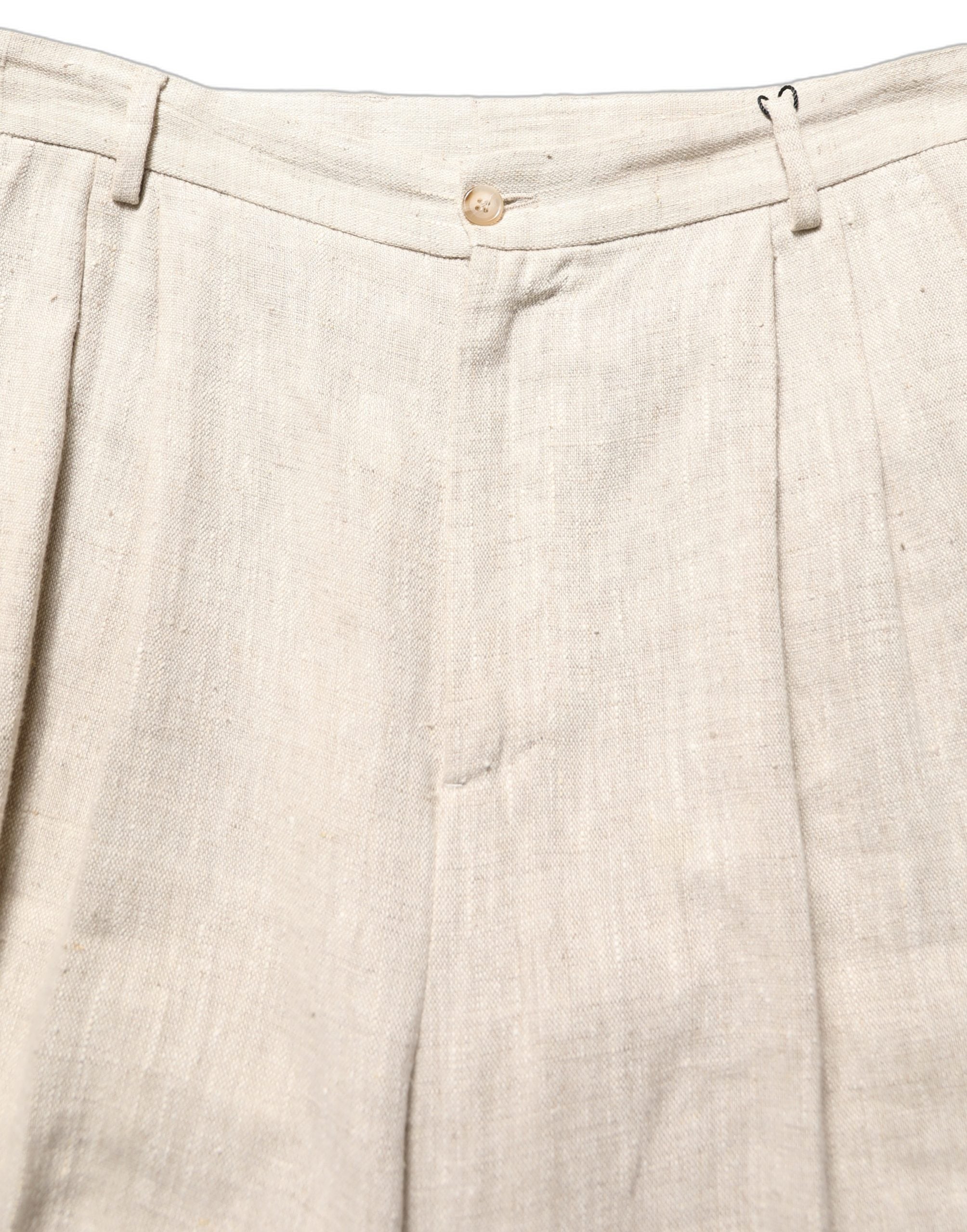 Pantalon homme en lin beige de coupe tapered de Dolce & Gabbana, style élégant et confortable.