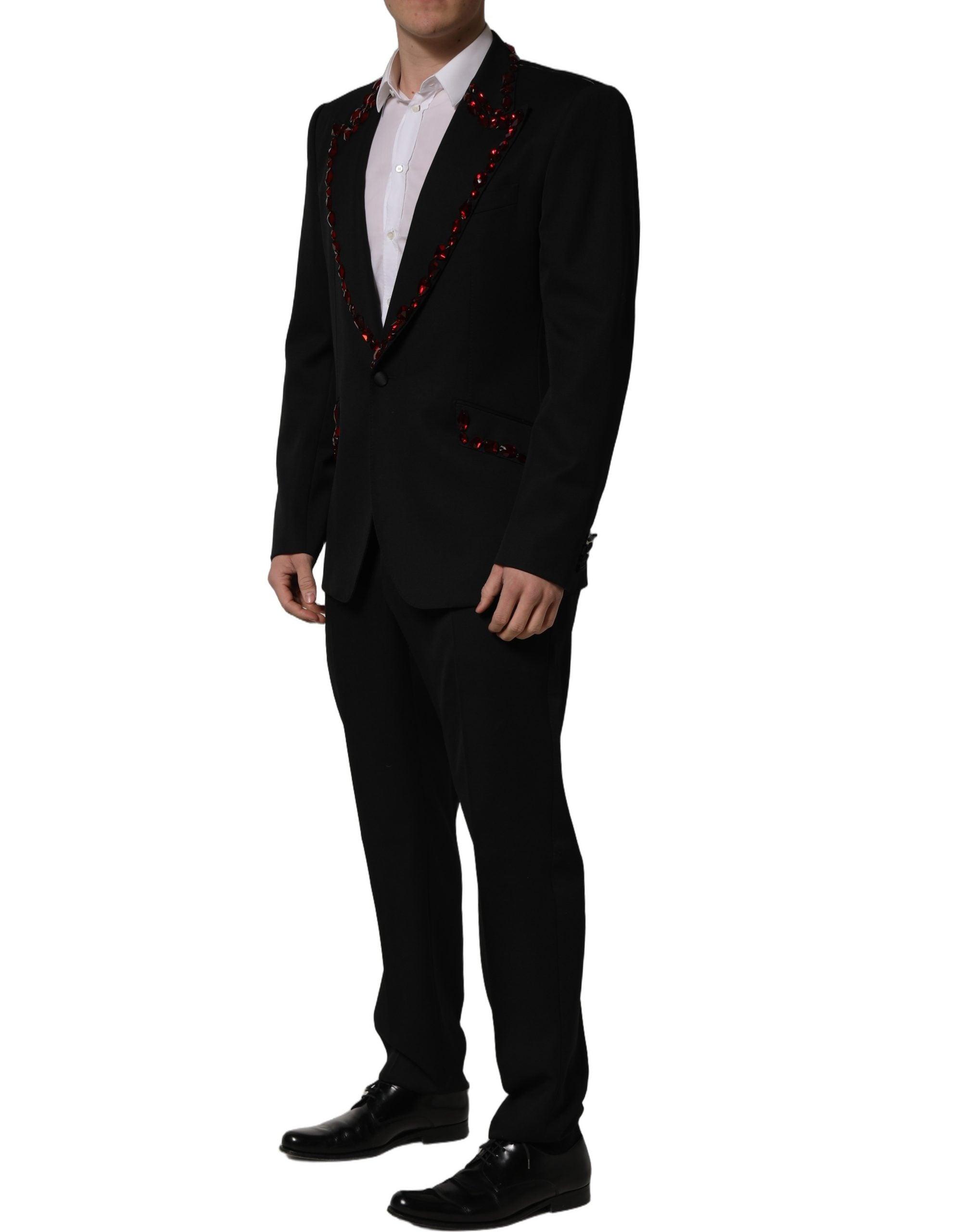 Costume deux pièces Dolce & Gabbana noir orné de cristaux, élégante tenue de soirée avec veste et pantalon.