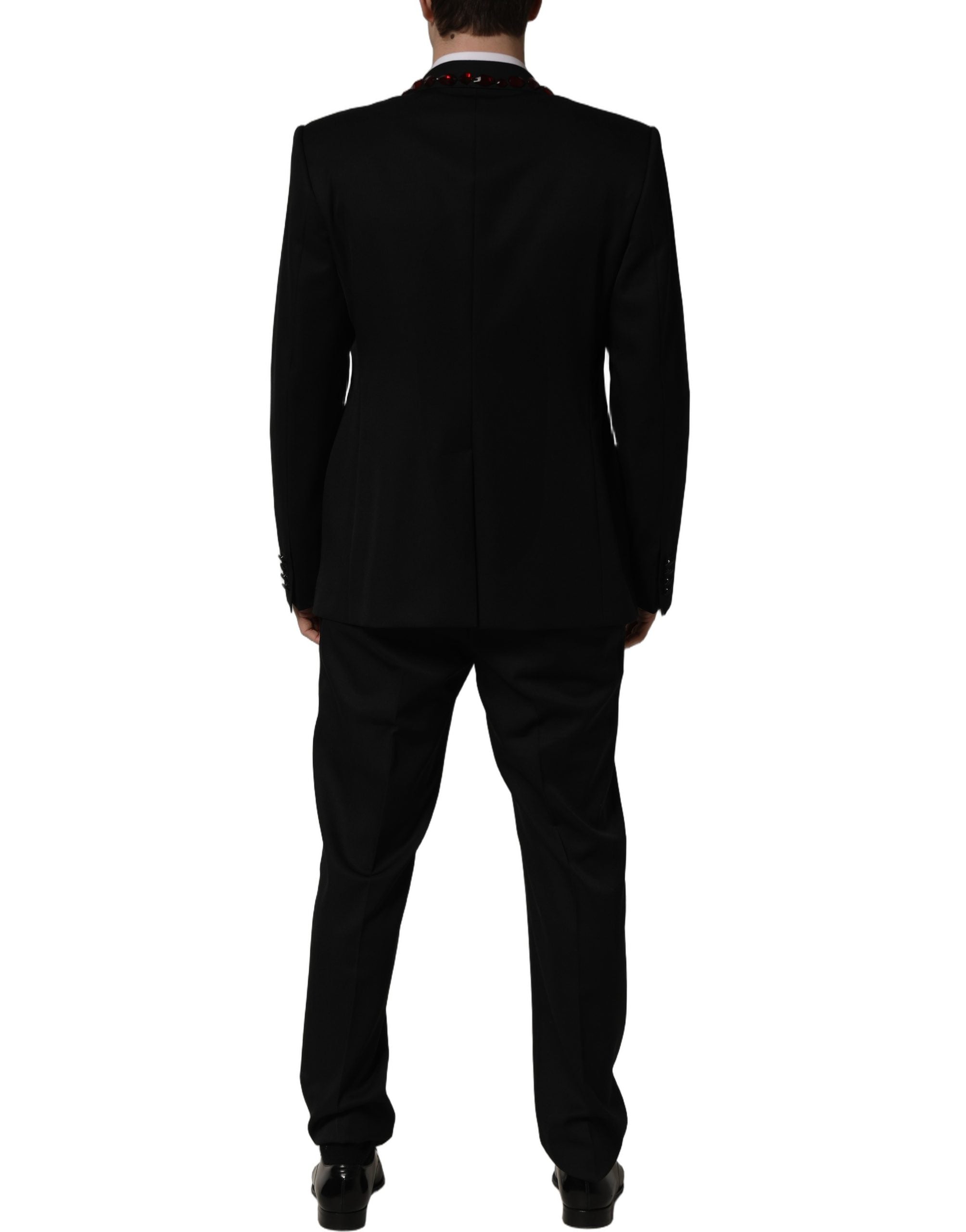 Tailleur deux pièces Dolce & Gabbana noir orné de cristaux brillants, élégant et sophistiqué, pour femmes.