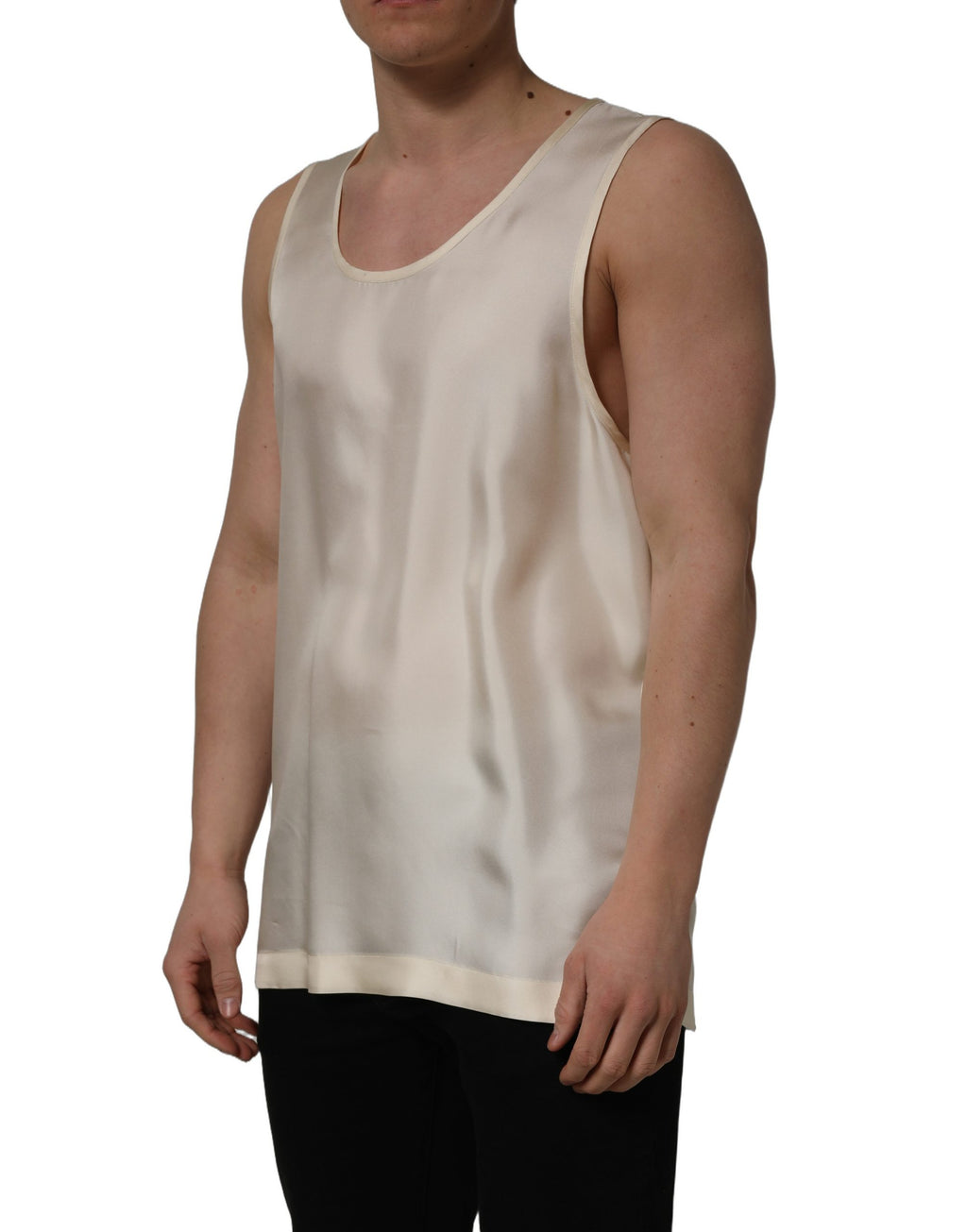 T-shirt sans manches en soie blanche Dolce & Gabbana, style élégant et léger, visible avec col arrondi et coupe ajustée.