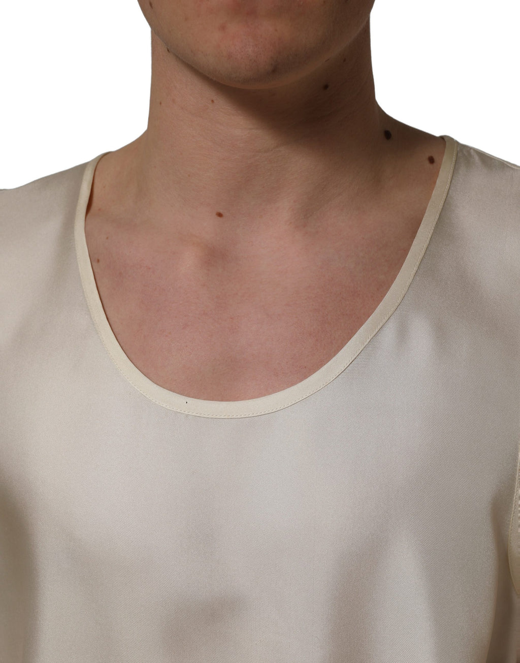 Débardeur sans manches en soie blanche de Dolce & Gabbana, style élégant et léger, parfait pour une tenue chic.