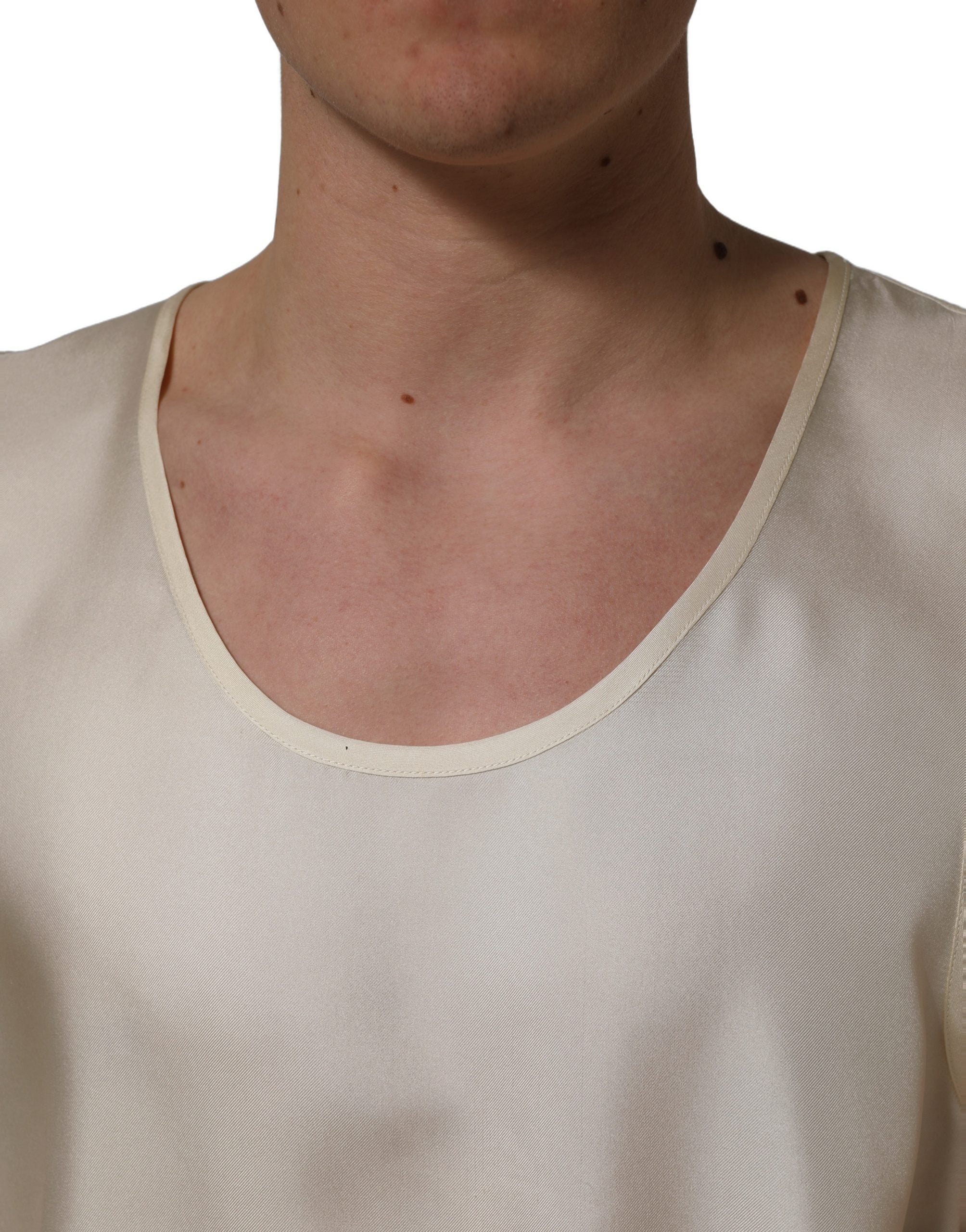 Débardeur sans manches en soie blanche de Dolce & Gabbana, style élégant et léger, parfait pour une tenue chic.