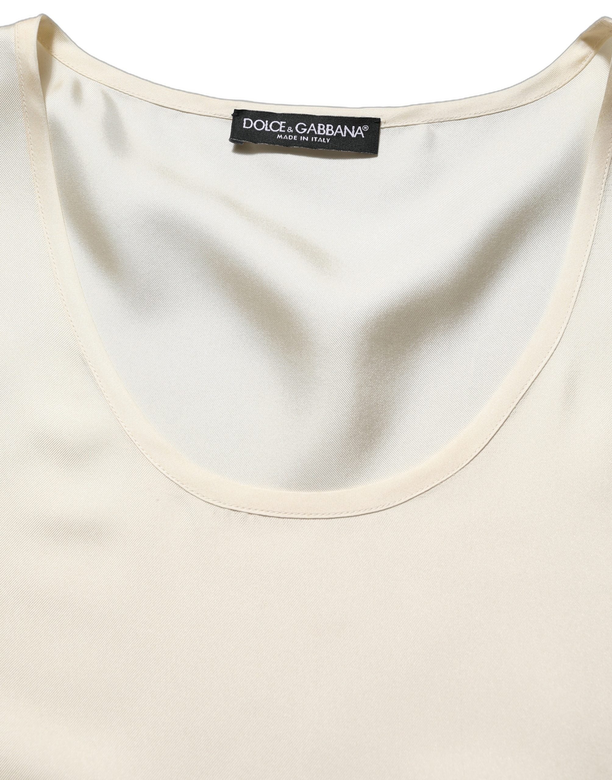 T-shirt sans manches en soie blanche Dolce & Gabbana, haut élégant avec coupe ajustée et finition lisse.