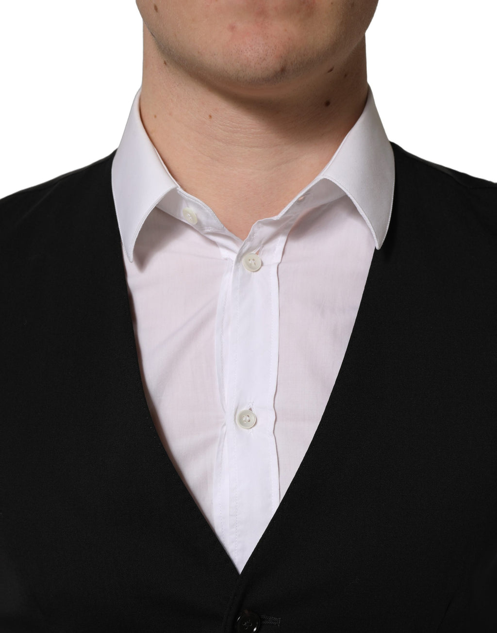 Gilet en laine noir Dolce & Gabbana à simple boutonnage, veste cintrée élégante pour homme.