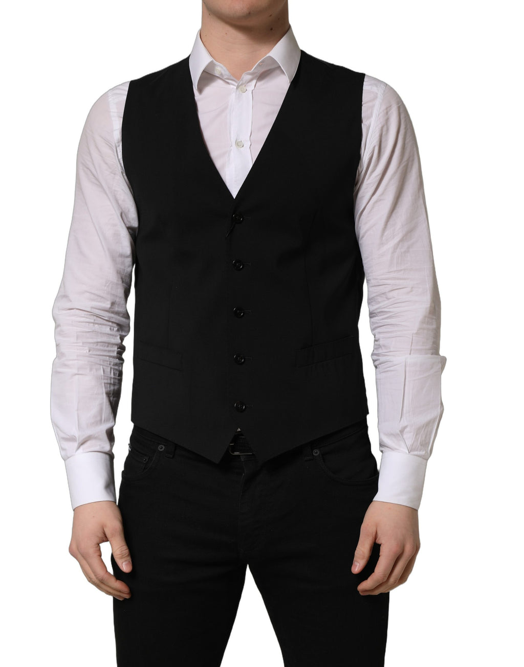 Gilet en laine noire Dolce & Gabbana à un seul bouton, coupe élégante, porté sur un fond neutre.