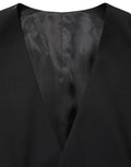 Gilet en laine noir Dolce & Gabbana à col montant et fermeture à boutons simples, porté de face sur fond blanc.