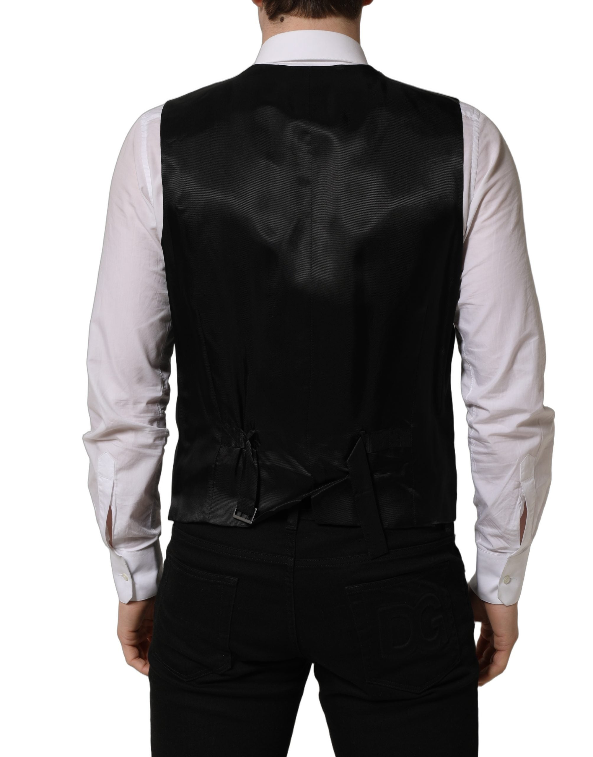 Gilet en laine noir Dolce & Gabbana à boutonnage simple, ajusté, avec col classique, porté sur un mannequin.