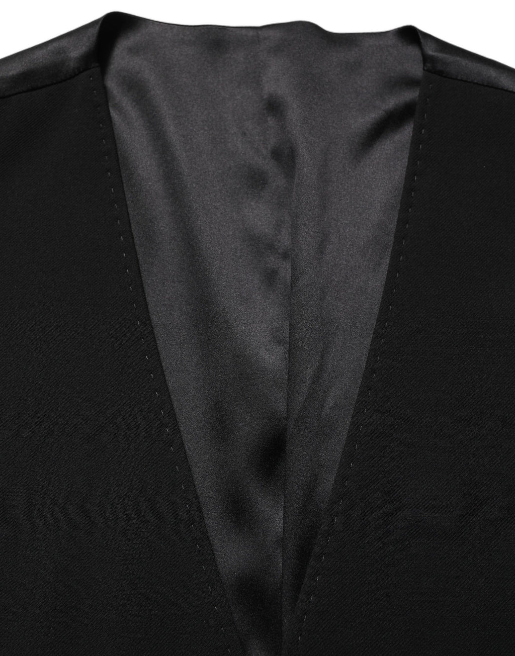 Gilet en laine noire Dolce & Gabbana à boutonnière simple, veste cintrée élégante pour homme.