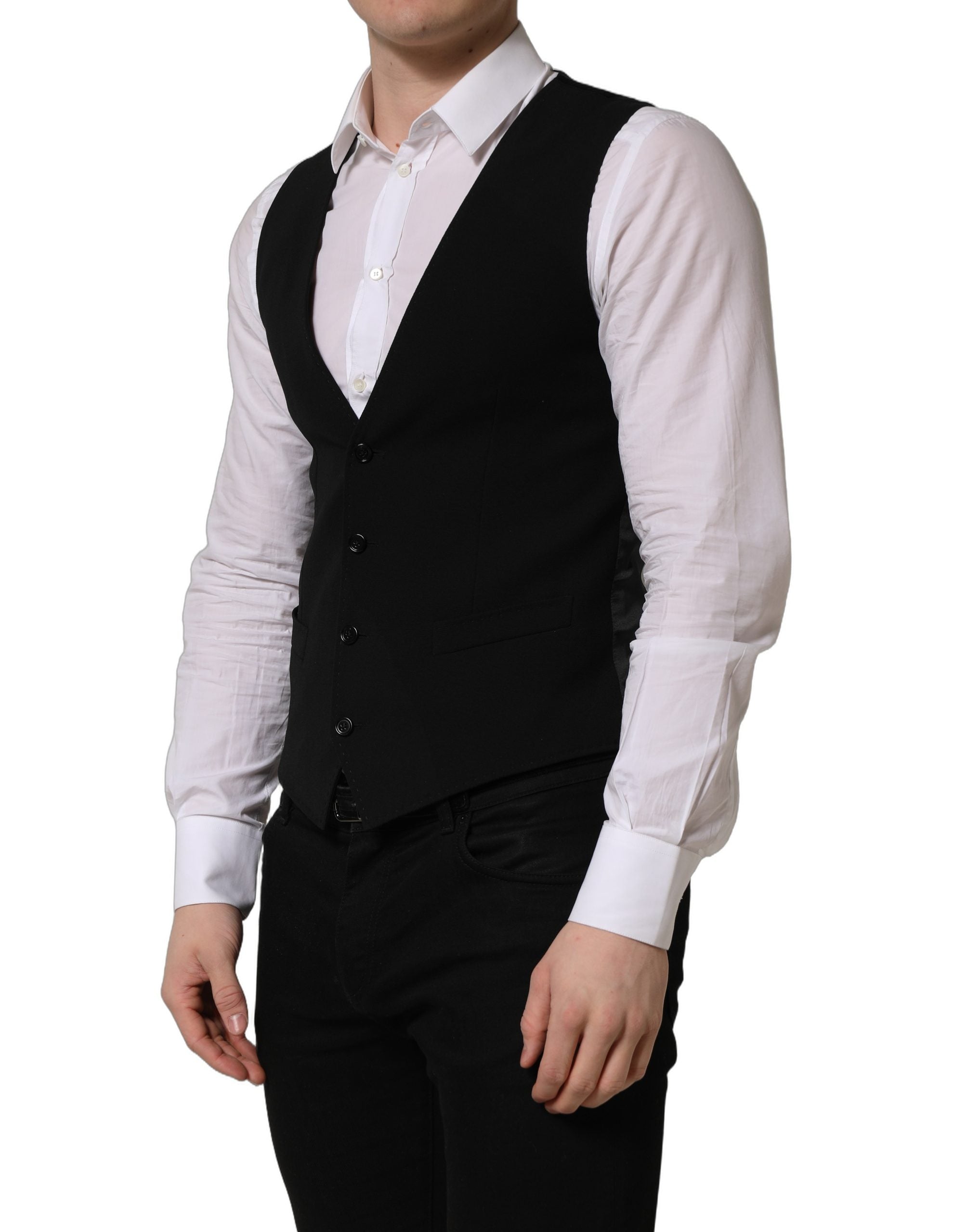Gilet en laine noir Dolce & Gabbana à boutonnière simple, porté sur un mannequin, détails de couture élégants.