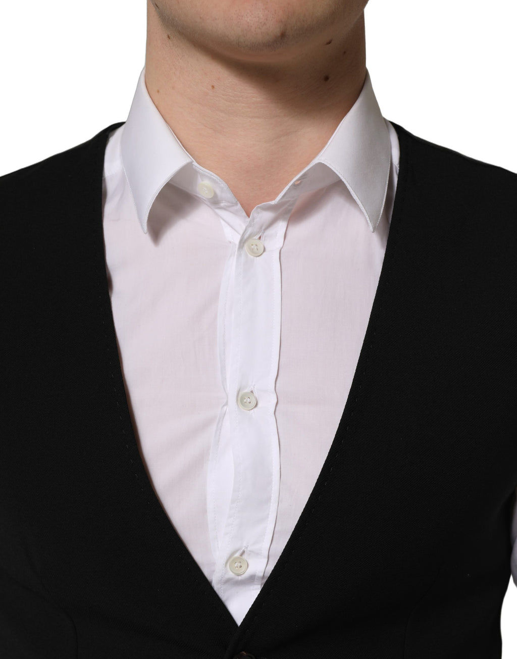 Gilet noir en laine Dolce & Gabbana à boutonnage simple, vue de face, détails élégants et coupe ajustée.