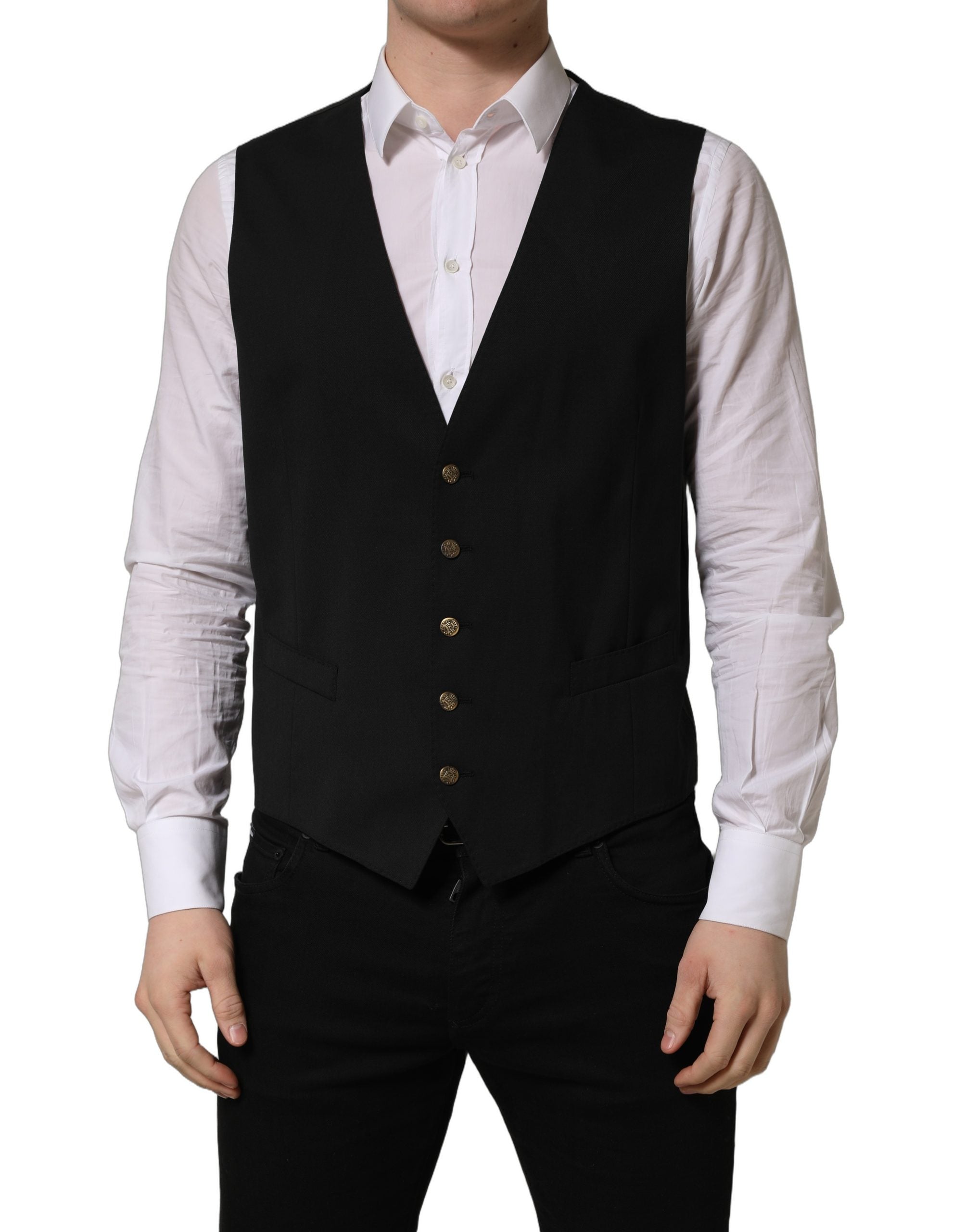 Gilet homme noir Dolce & Gabbana à un seul rang de boutons, en tissu élégant, porté sur un fond neutre.