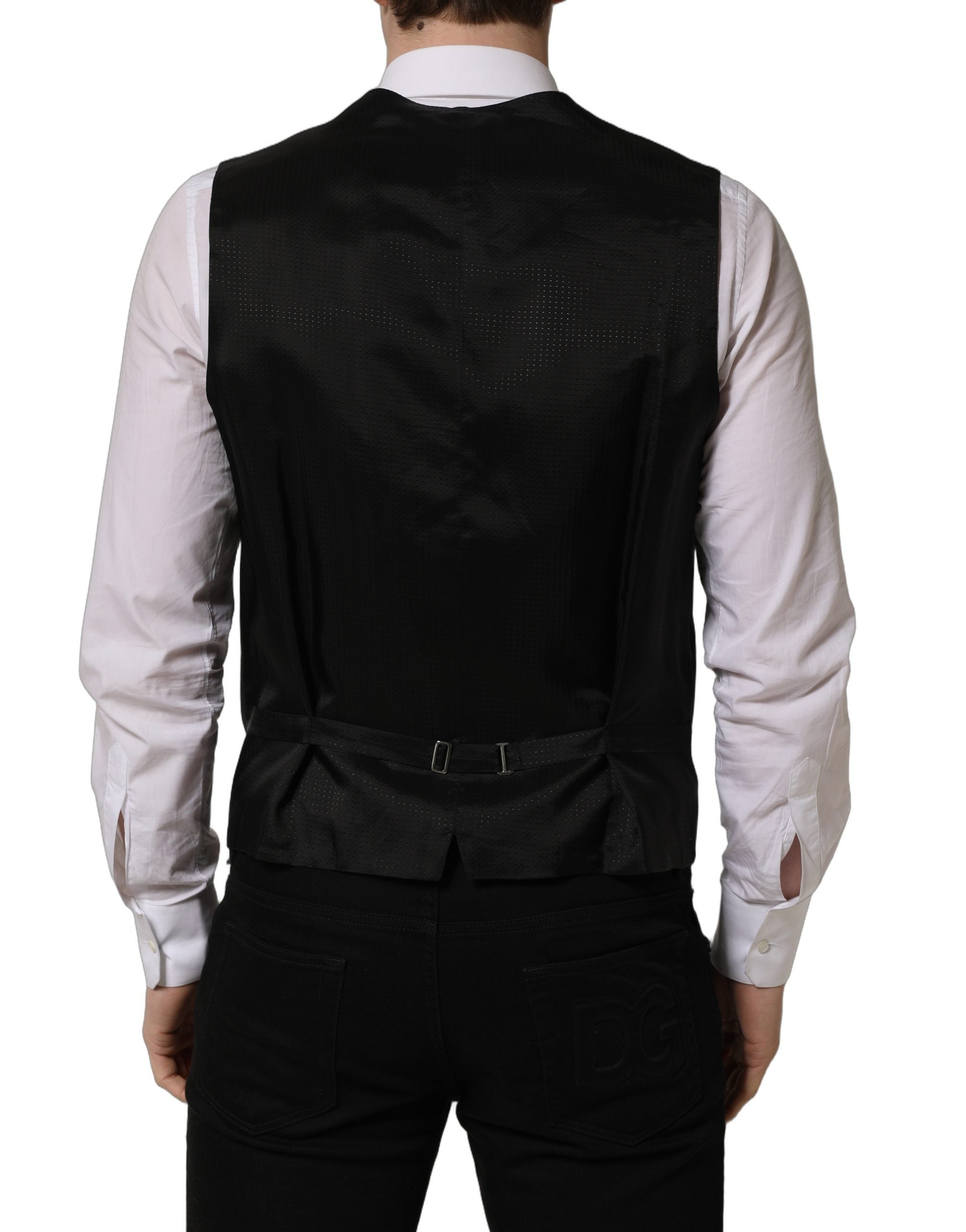 Gilet homme noir Dolce & Gabbana à boutonnière simple, en tissu élégant, porté sur un mannequin.